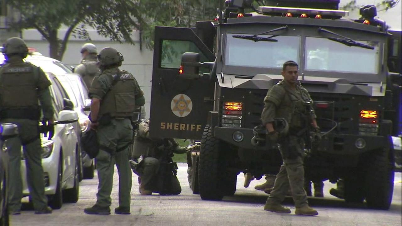 SWAT team takes man into custody after hourslong standoff in West ...