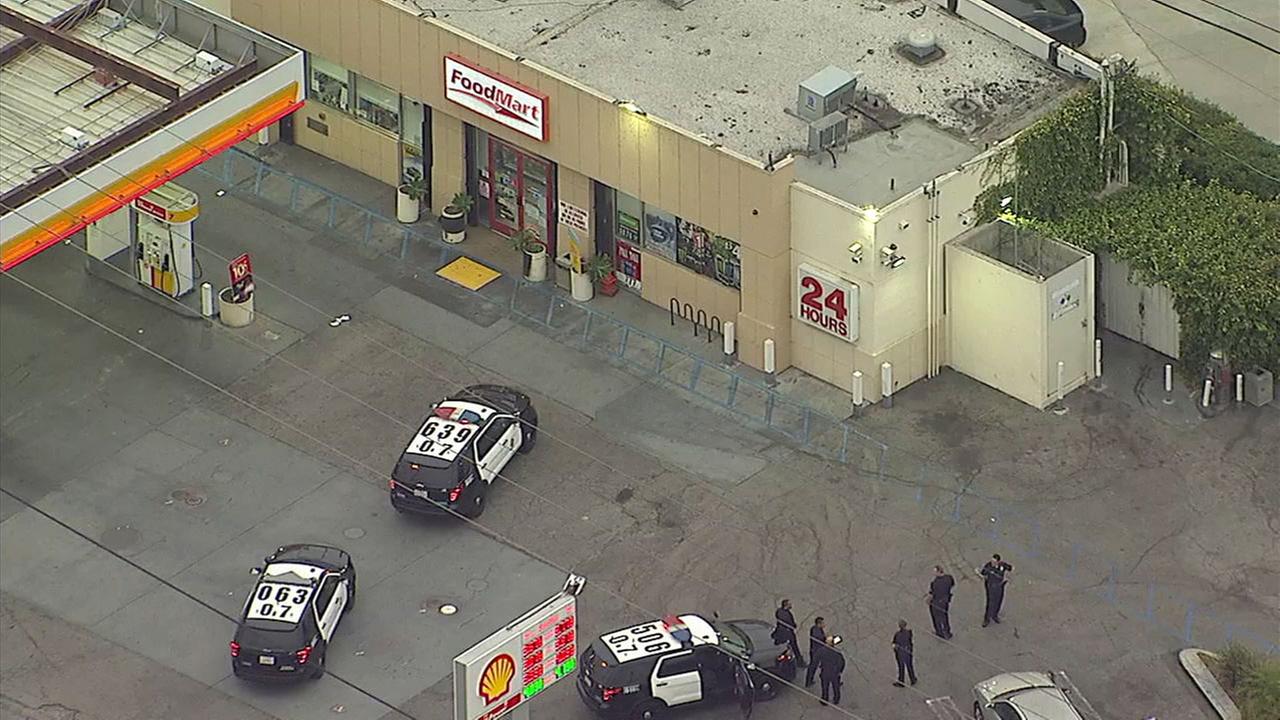 2 arrested in robbery, fatal shooting of clerk at MidCity gas station