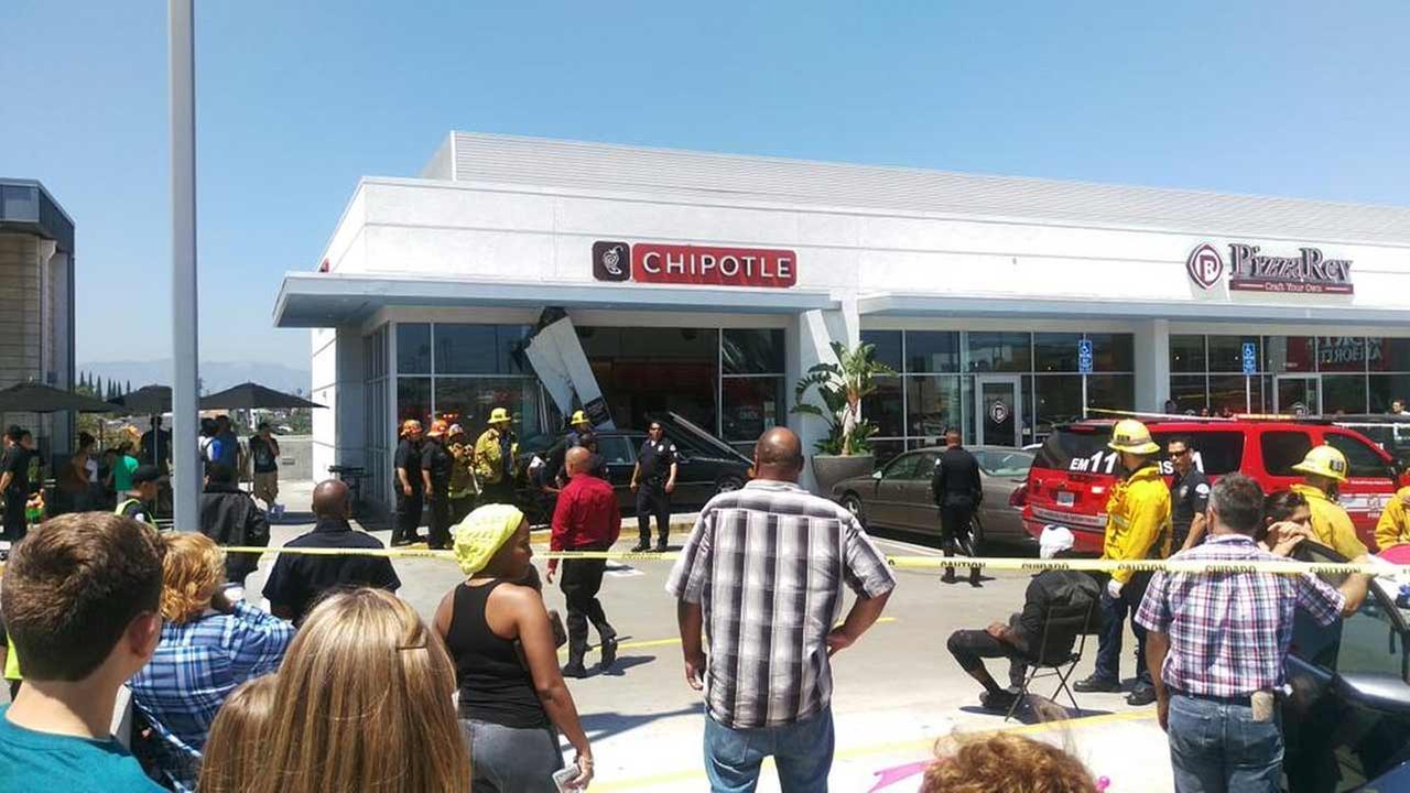 8 injured after car hits storefront of Chipotle in MidCity