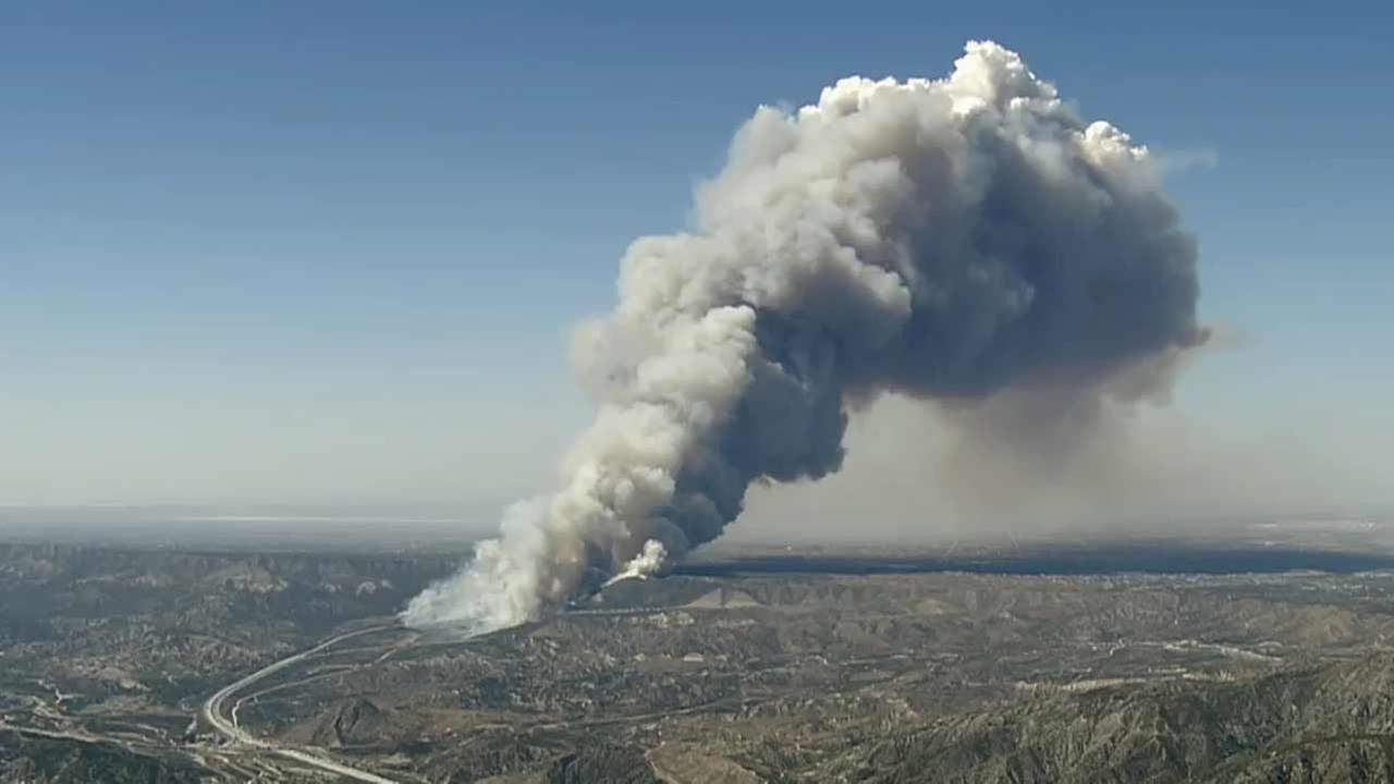 Brush fire erupts next to 15 Freeway in Cajon Pass | KABC7 Photos and