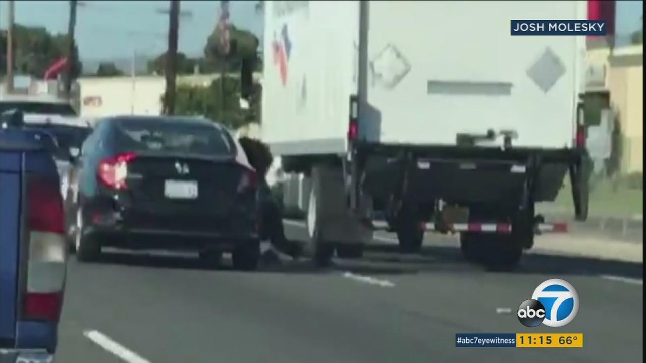 Woman Holds Onto Car As It Travels On California Freeway In Apparent Road Rage Incident Woman Holds Onto Car As It Travels On California Freeway In Apparent Road Rage Incident