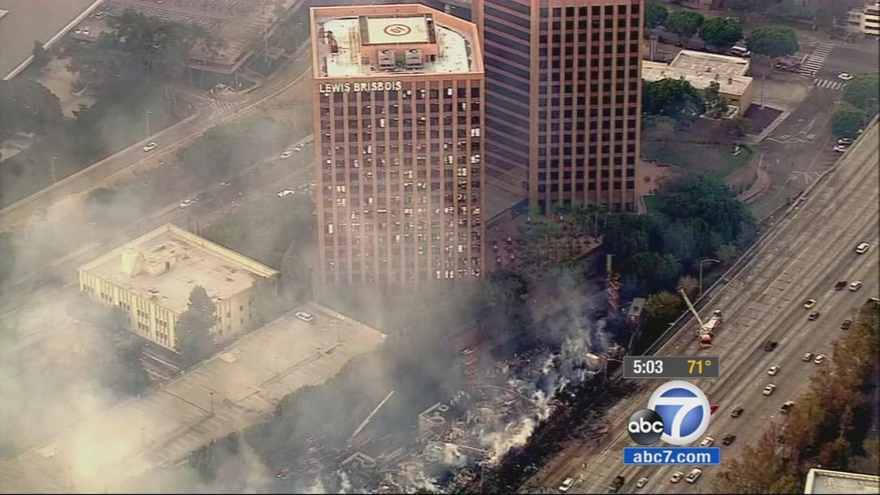 Downtown LA buildings damaged in massive fire