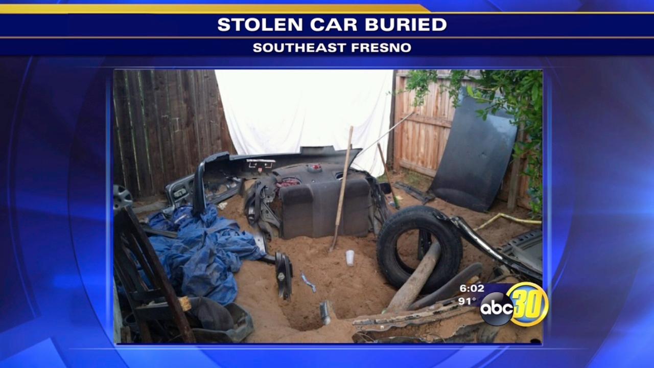 Stolen car found buried in backyard of Southeast Fresno house