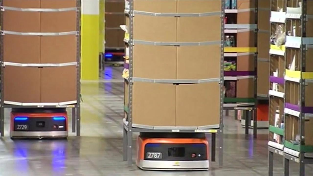 Amazon employees get help from Kiva robots on Cyber Monday at Tracy