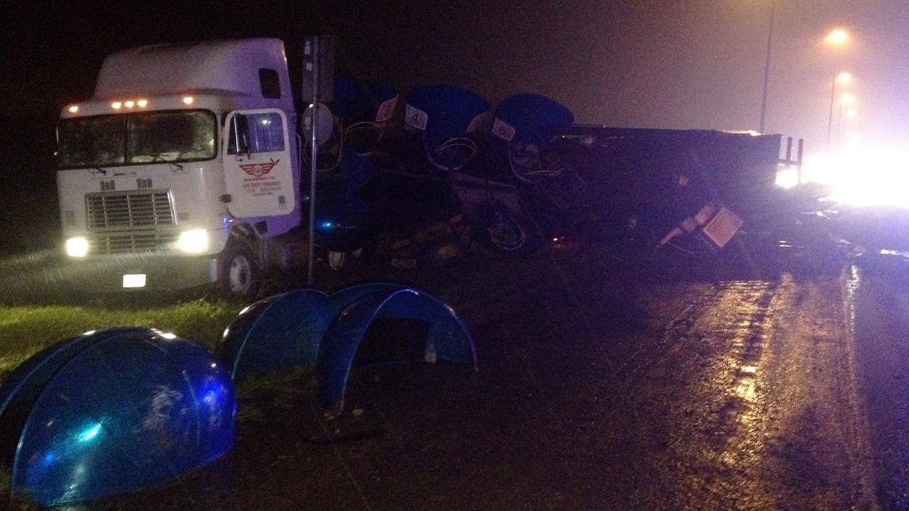 Big rig carrying carnival ride crashes on 288, one woman hospitalized