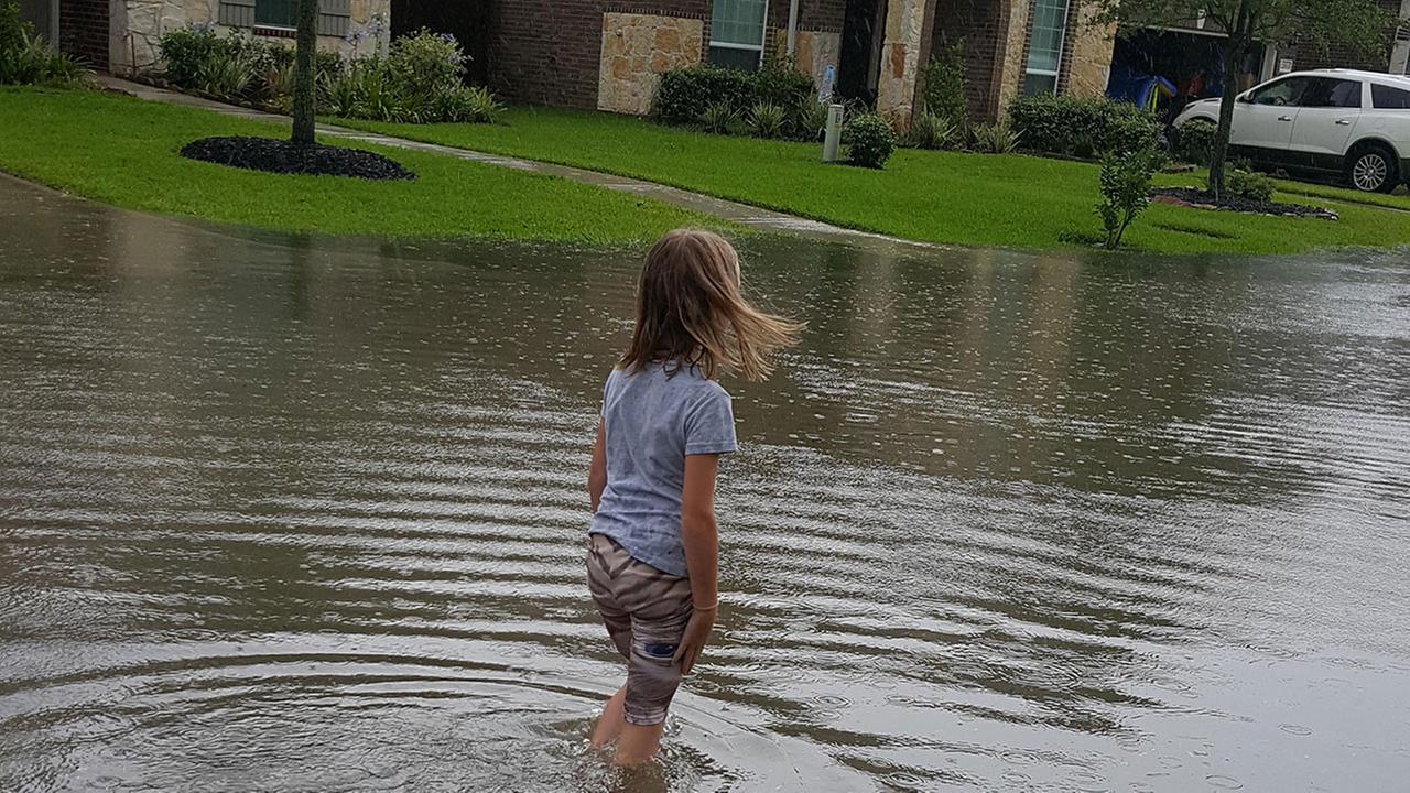 WEATHER ALERT Damage in Pearland; voluntary evacuations in Bolivar