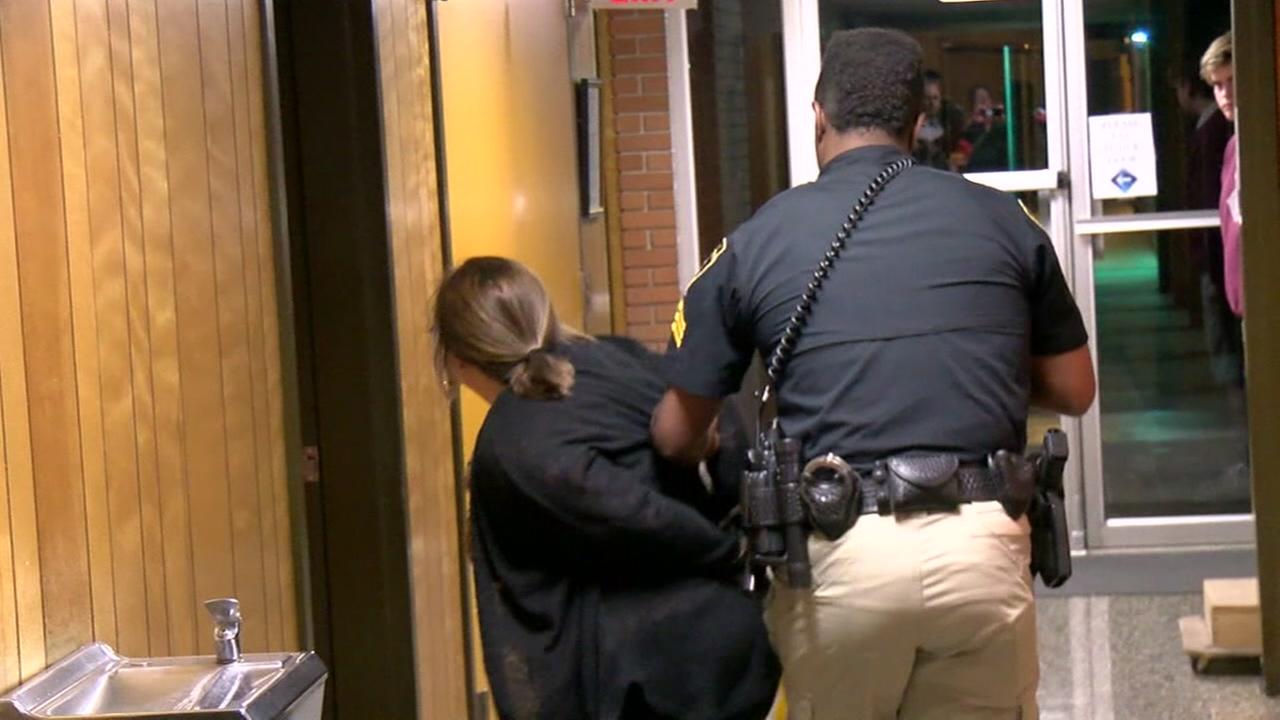 Teacher handcuffed after speaking up at school board meeting | abc13.com