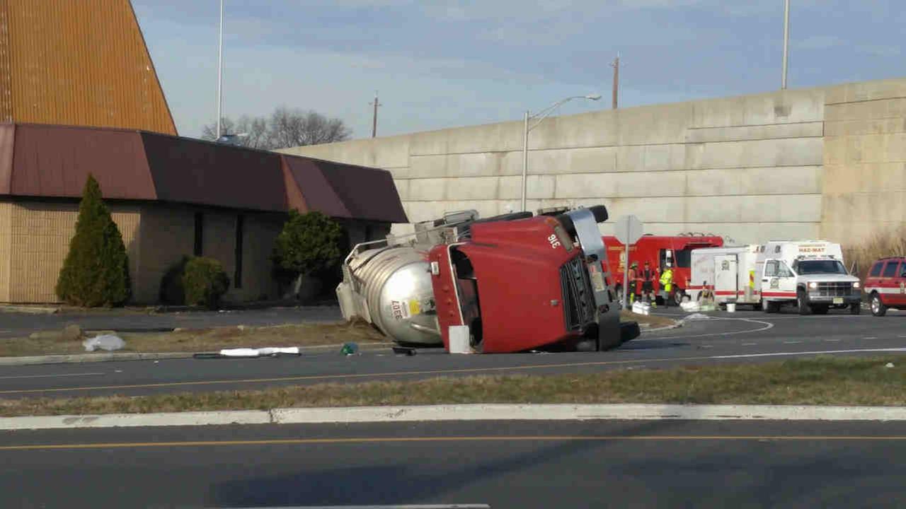 Tanker truck flips over in Raritan, New Jersey, causing road closures