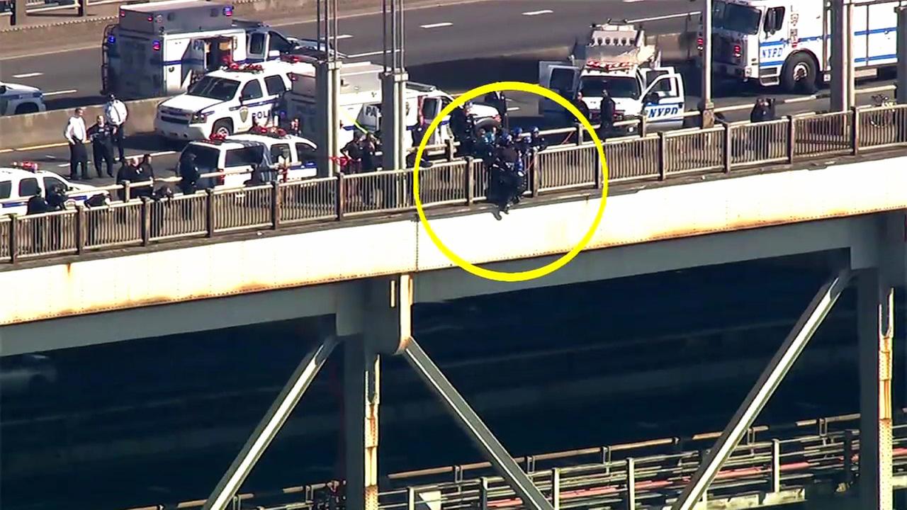 VIDEO Suicidal man threatening to jump off Washington Bridge