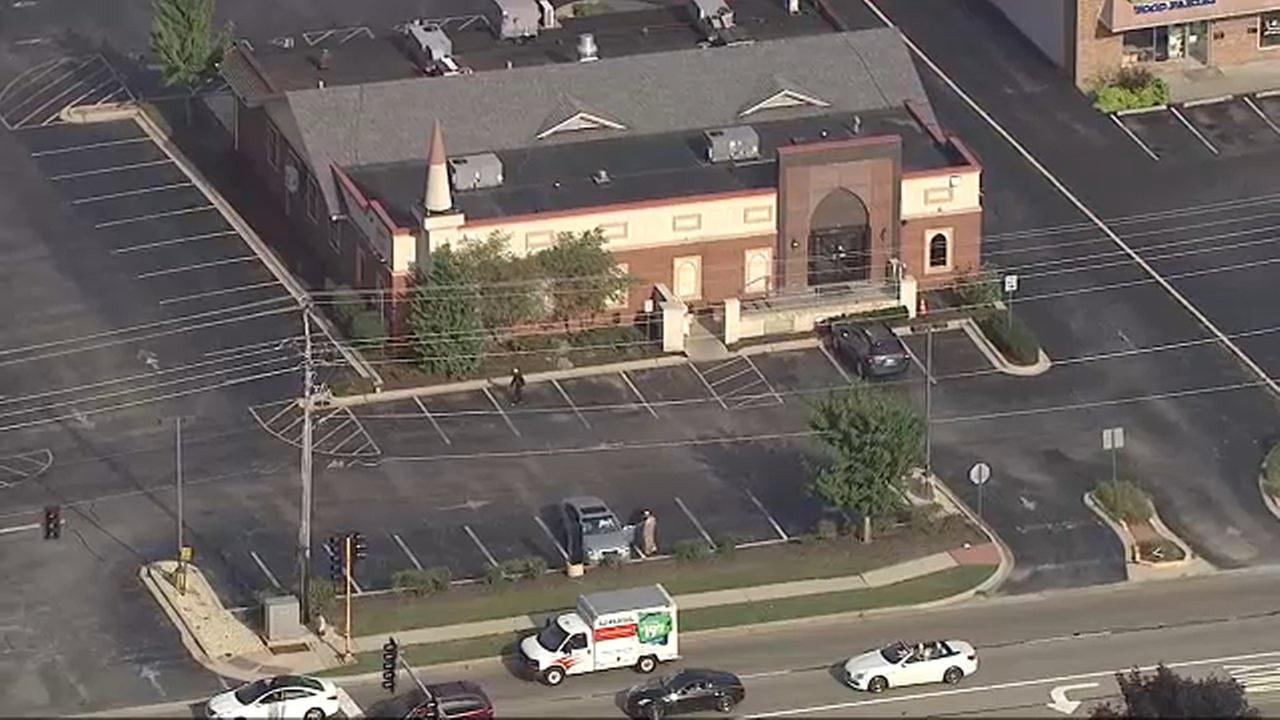 Glendale Heights tow truck driver charged after towing pizza delivery car with c...