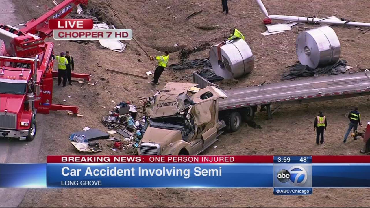 2 people, dog rescued from semi truck accident on Route 53 in Long