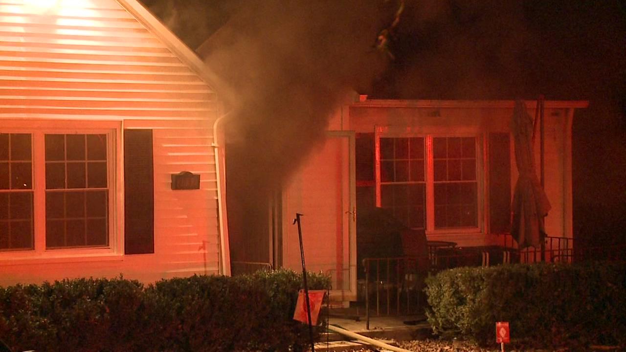 Crews battle basement fire in Durham