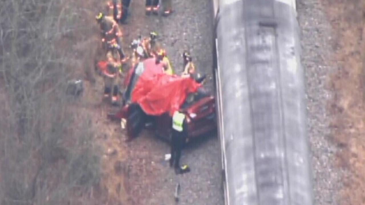 911 caller Man drove through railroad stop arms before fatal Amtrak