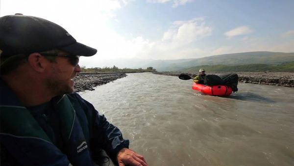 Greg Aiello Crosses the Teklanika River in the Alaskan Wilderness